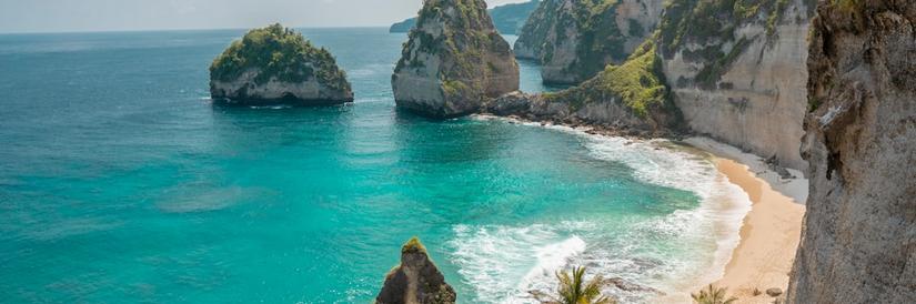 Seascape of sandy beach and cliffs in Bali Indonesia